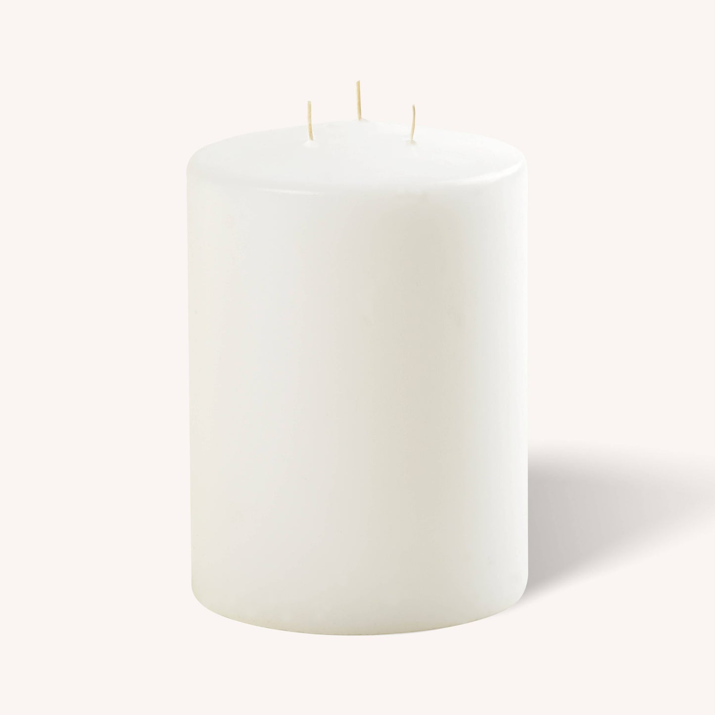 White 3 wick pillar candle, 6 inch by 8 inch