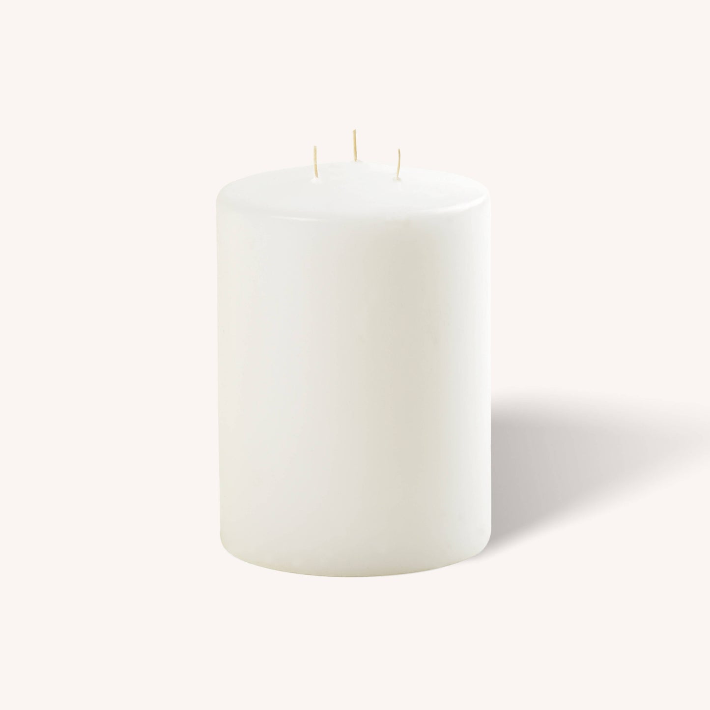 White 3 wick pillar candle, 4.75 inch by 6 inch