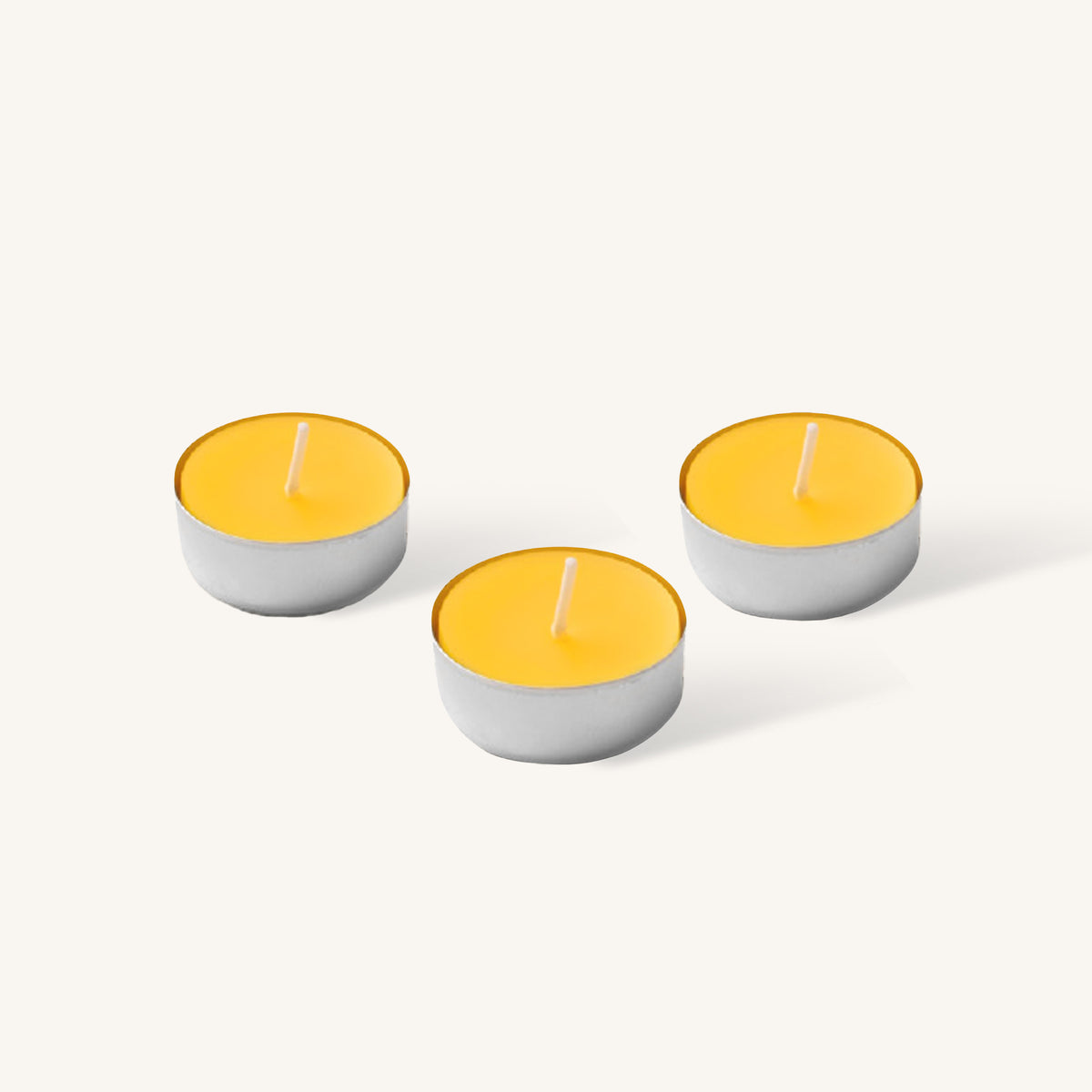 Yellow beeswax tealight candle in aluminum cup, 4 hour burn, pack of 12