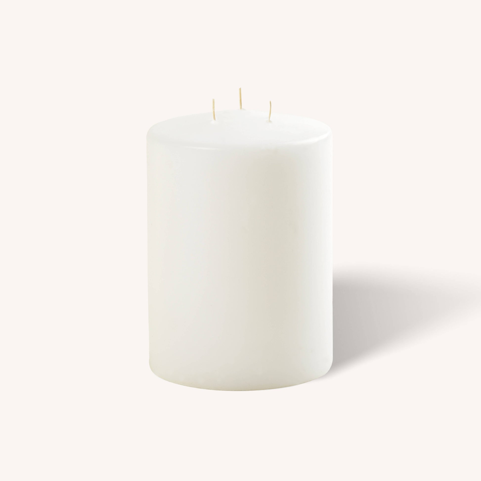 White 3 wick pillar candle, 4.75 inch by 6 inch